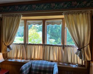 Many Sets of Window Curtains
