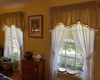 Many Sets of Window Curtains
