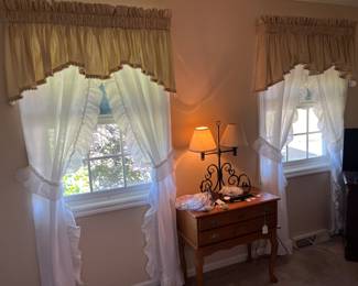 Many Sets of Window Curtains
