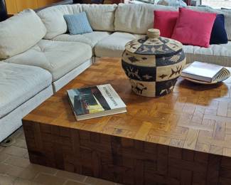 Custom 70s sectional sofa and large parquet cocktail table!