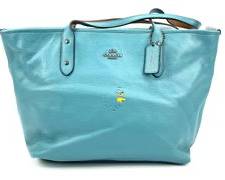 COACH "Woodstock" of "Peanuts" Fame Light Blue Pebbled Leather Tote Bag
