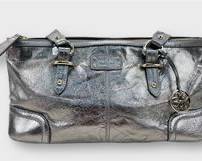 The SAK Eye-catching Gunmetal Leather Long Zippered Handbag
