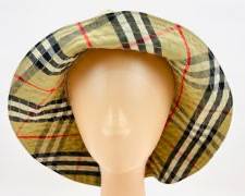 BURBERRY's Vintage Rain Hat with Signature Plaid Brim
