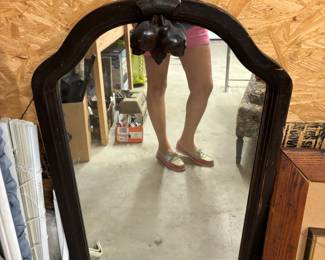 Mirror with carved fruit at top