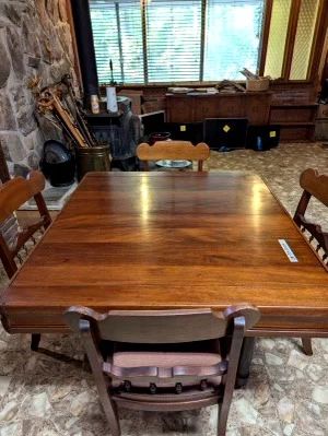 #1	Antique wood table with accordion pull out leaves built in and 4 chairs 38-71x42x29	 $275.00 
