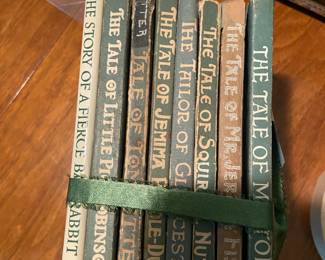#232	Book 	(8) Antique Beatrix potter books 	 $25.00 			
