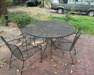 #205	Wrought Iron Round patio table with 4 chairs 48x29	 $75.00 
