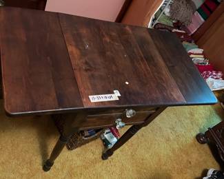 #119	Wood End table w/2 drawers and drop sides (glass knobs)	 $75.00 
