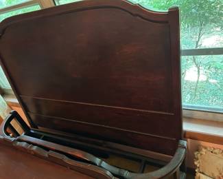 #105	Full size bed frame with curved footboard 54" wide	 $125.00 
