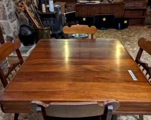 #1	Antique wood table with accordion pull out leaves built in and 4 chairs 38-71x42x29	 $275.00 

