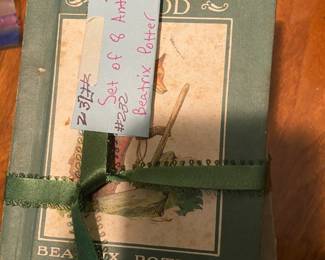 #232	Book 	(8) Antique Beatrix potter books 	 $25.00 			
