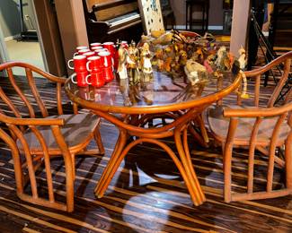 Vintage rattan glass topped table and chairs
