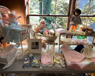 Dolls, clothes, cradles