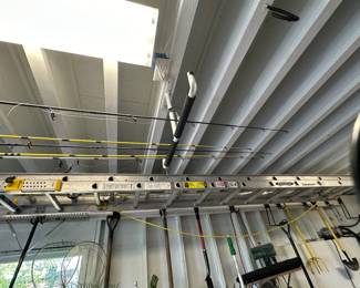 Extension ladder and fishing poles