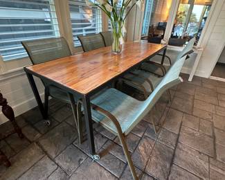 One of two metal and wood tables & patio chairs 
chairs sold separately