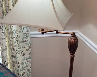 Copper tone swivel floor lamp