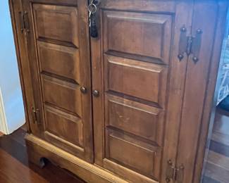 Vintage bar cabinet with locking doors