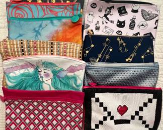 Assorted Ipsy cosmetic bags