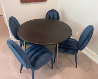 Dining Table with Velvet Upholstered Armless Chairs