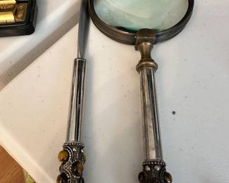 leather opener and matching magnifying glass