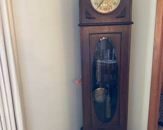 19 century German Grandfather clock in working order, keeps perfect time.