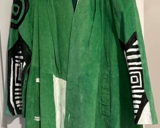 Painted 80s green suede swing coat front