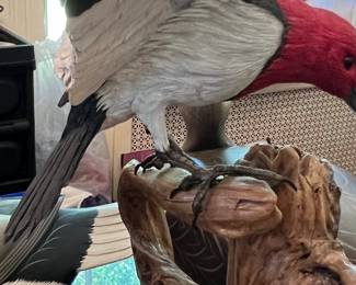39. Carved Bird Sculpture by Jim Lowell (12" x 15")