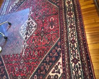 77. Wool Handknotted Rug (7' x 10')