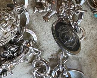 #51 - $100.00 - Sterling charms bracelet 47.51gr - 7"