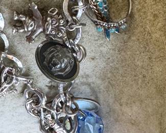 #51 - $100.00 - Sterling charms bracelet 47.51gr - 7"