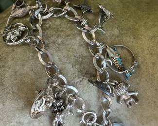 #51 - $100.00 - Sterling charms bracelet 47.51gr - 7"