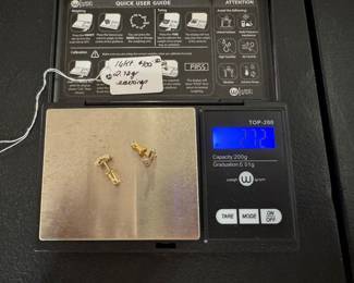 #50 - $100.00 - 14kt gold X shaped earrings 2.72 gr.