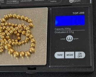 #48 - $165.00 - 14kt gold beads necklace 4.39gr