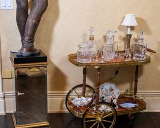 Italian inlaid bar cart. Waterford decanters.