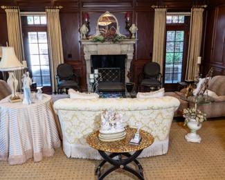 Custom-designed grape and vine coffee table and pair of Ralph Lauren armchairs and ottomans. Sarreid leopard tray stand.