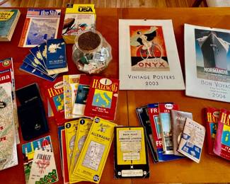 Lot 049-LR: Oh, The Places We Will Go!

Features: 
•	Enjoy this large collection of maps and travel memorabilia spanning a host of domestic & international locations from Tennessee to Paris, France. Many international maps in collection are vintage.
•	2 Travel Poster Calendars

Dimensions: N/A

Condition: Varies; Some items are vintage and well-used.

