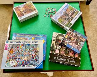 Lot 046-B: Puzzle Board & Puzzles Galore

Features: 
•	A treasure trove for the jigsaw puzzler (aka “Dissectologist”)
•	Includes a convenient spinning puzzle board with felted top to keep pieces in place
•	Jigsaw puzzles include brands Ravensburger and Prism and various themes including Christmas and sceneries
•	Quantity of puzzles in this lot fills 5 small moving boxes 

Dimensions: Puzzle board: 35” x 35” Puzzles vary in size.


Condition: Fair to good pre-owned. We cannot guarantee all puzzles have all pieces present.

