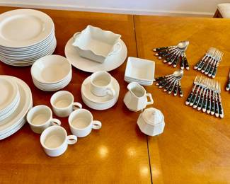 Lot 056-K: White Dishware & Stainless Flatware

Features: 
•	Various brands of white and off-white dishware including: 3 square bowls, 1 cream & 1 sugar containers, 1 serving platter, 1 serving dish, 5 mugs, 8 saucers, 7 cereal bowls, 7 salad plates, 6 dinnerplates (off-white) and 12 dinnerplates (white)
•	Flatware includes forks, knives, and spoons. See pictures for details.

Dimensions: Mugs are 2.5”H. Serving platter is 12.5”diameter.


Condition: Used condition. Some minor flaws and marks from use are present.


