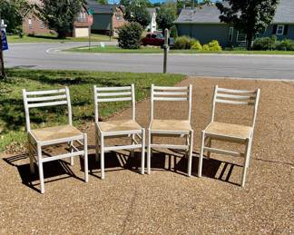 Lot 031-G: Quartet of Ladderback Chairs

Features: 
•	Four white ladderback chairs
•	Wood-framed with wicker seats

Dimensions: 16”W x 36”H; 16” seat depth; seat height is 18”

Condition: Good pre-owned condition. A few chips in the paint. Seats are in good condition.
