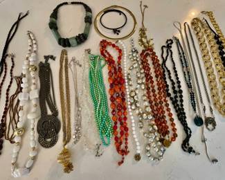Lot 001-J: Costume Necklace Collection #1

Features: Over 20 colorful costume necklaces
•	Please see photos for details

Condition: Generally Good Pre-Owned Condition. Please see photos for additional details.
