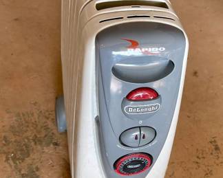 Lot 040-G: Delonghi Rapido Electric Oil-Filled Radiator

Features: 
•	Portable area heater
•	24-hour programmable (analog/manual) timer
•	Easily rolls to any area

Dimensions: 5 1/2” W x 17”D x 25 ½”H


Condition: Good working pre-owned condition. We briefly powered it up.

