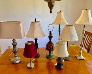 Lot 041-LR: Table Lamp Lot

Features: 8 various-styled table lamps, including one pair of matching buffet-style lamps


Dimensions: For reference: the matching pair lamps are 33”H. The shortest lamp with the red lampshade is 13.5”H.

Condition: Varies from fair to good condition. Please see pictures for additional details.


