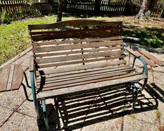 Lot 028-PAT: Vintage Patio Glider

Features: This vintage glider has seen better days, but is just a few wood slats and a coat of Rust-Oleum away from gracing a your patio and providing countless hours of relaxation!

Dimensions: 72”L (including arm rests); frame measures 26”W x 37”H at the back (seat height is 18” from the ground)

Condition: Restorable condition

