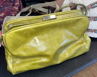 Green leather clutch