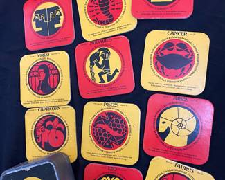 Vintage Kodak tin of 11 zodiac coasters, unused.