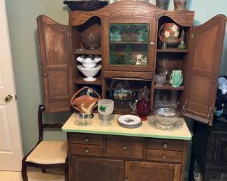 Hoosier Cabinets filled with Antiques including Roseville and other antique glassware