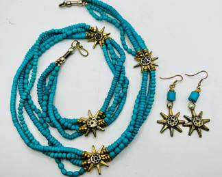 Turquoise Colored Necklace & Earrings with Sun Medallions
