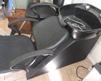 Beauty salon or barber shop shampoo chair with sink
