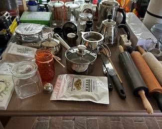 Some of the several tables of miscellaneous items to check out