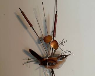 This little bird will greet you as you walk into the house